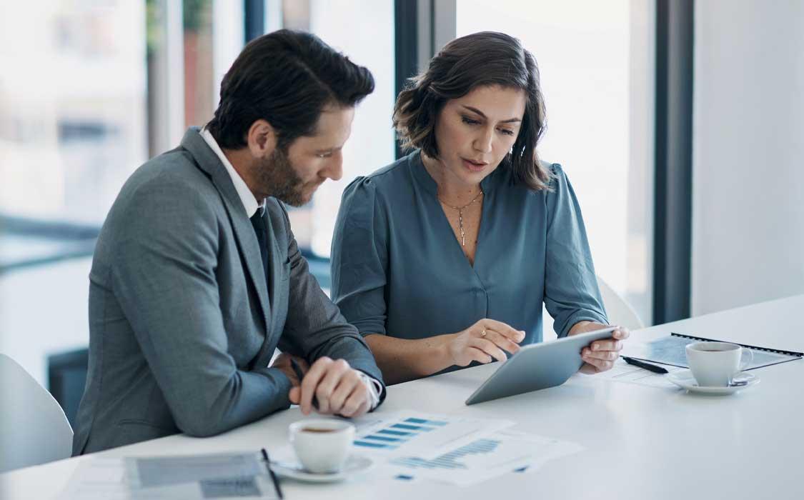 A banker and a client discussing wealth management 